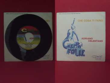 Foto: Sells 45 RPM CHE COSA TI FAREI - ADRIANO CELENTANO